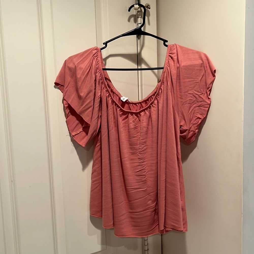 Pink off the shoulder shirt. Gently worn. Size L